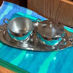 Vintage cream and sugar set on an oval tray